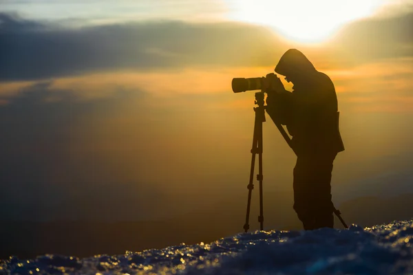 Photographer silhouette  mountains
