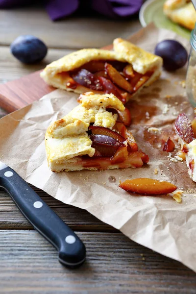 Slices of pie with plums