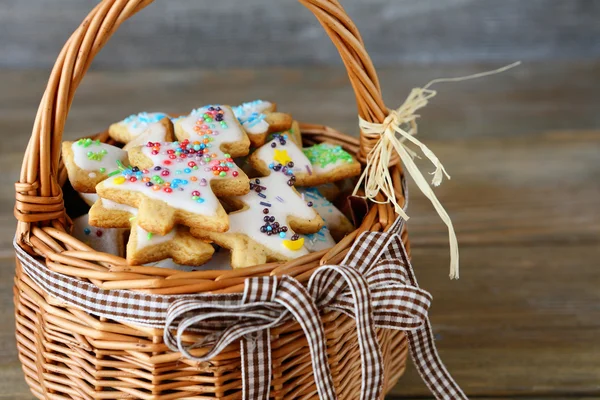 Icing sweet cookies in a basket