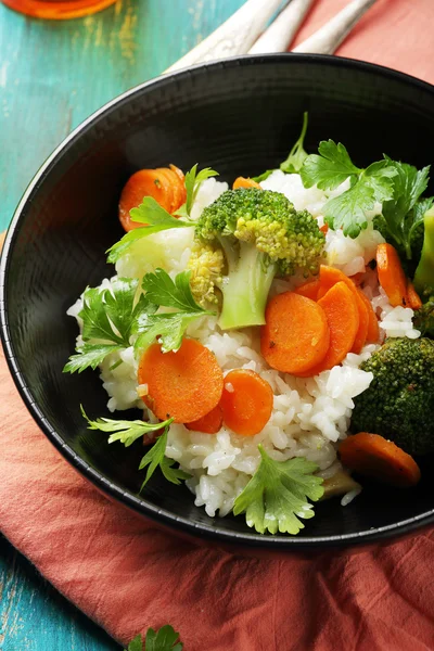 Rice with roasted carrots and broccoli