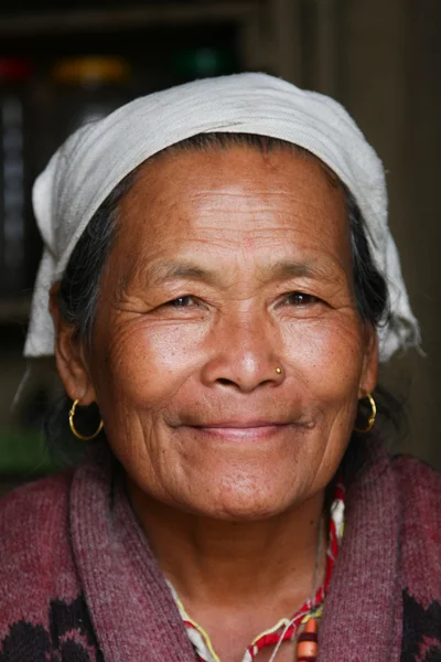 KATHMANDU, NEPAL-DECEMBER, 2009 - An unidentified nepalese woman doing their daily life duty along the street