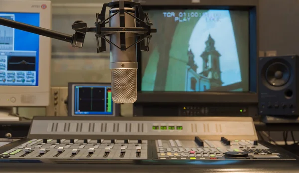 Condenser microphone in TV production studio interior