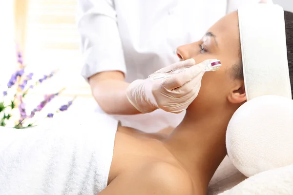 Mesotherapy microneedle, the woman at the beautician