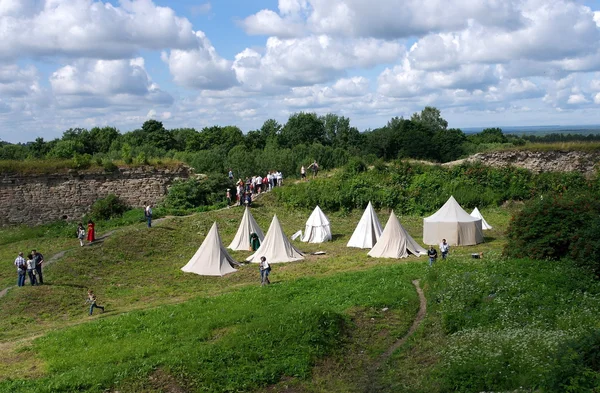 Koporje, Leningrad, Russia 2012 July 21. Reconstruction of knightly duels and battle chivalrous life camp, tents