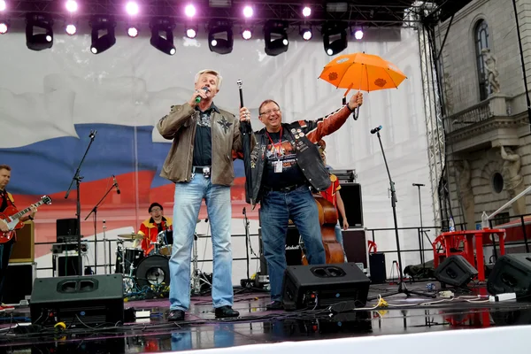 St. Petersburg, Russia - August 11, 2013: concert organizers in Catherine Square in celebration of the 100th anniversary of Harley Davidson.