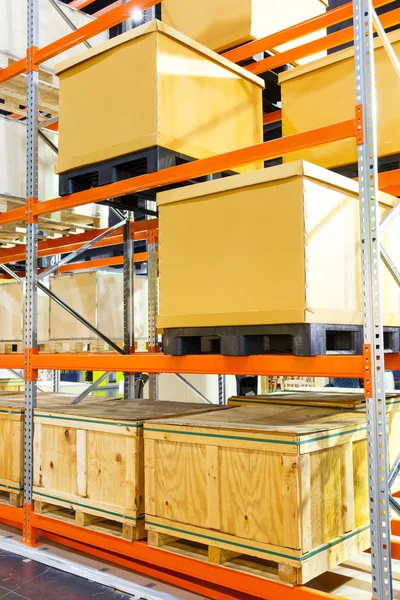 Cargo box on steel shelf system in warehouse