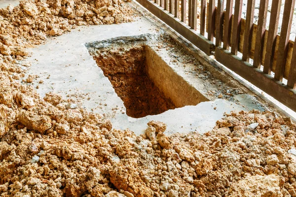 Digging hole on concrete floor