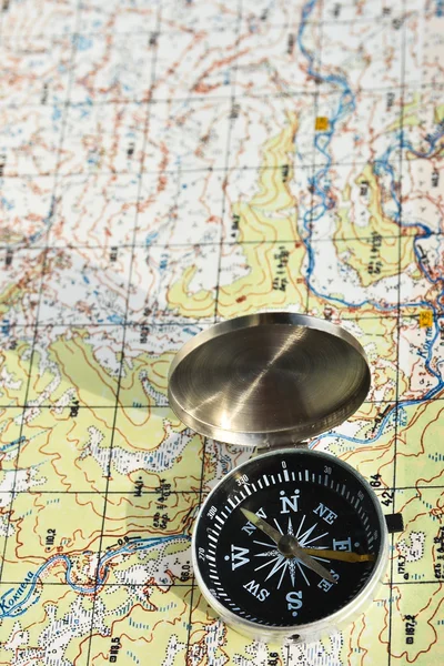 Travel compass and map symbols adventures.