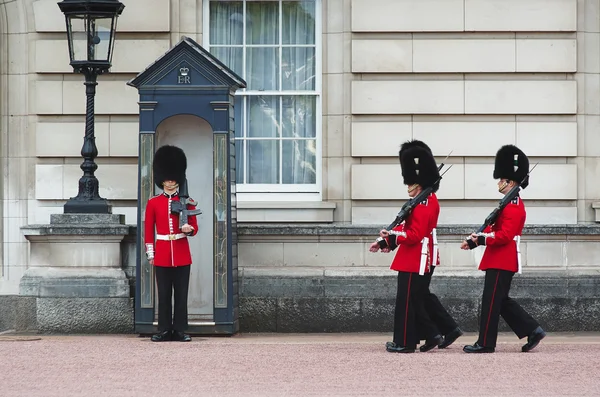 LONDON - AUGUST 8, 2015: Changing of the guard in Buckingham Palace.