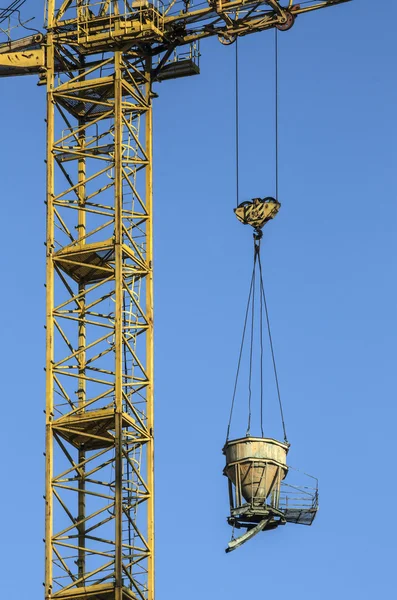 Crane with a suspended load