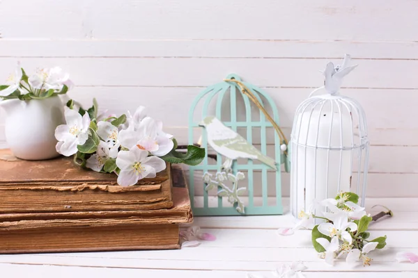 Apple blossom, books and candle