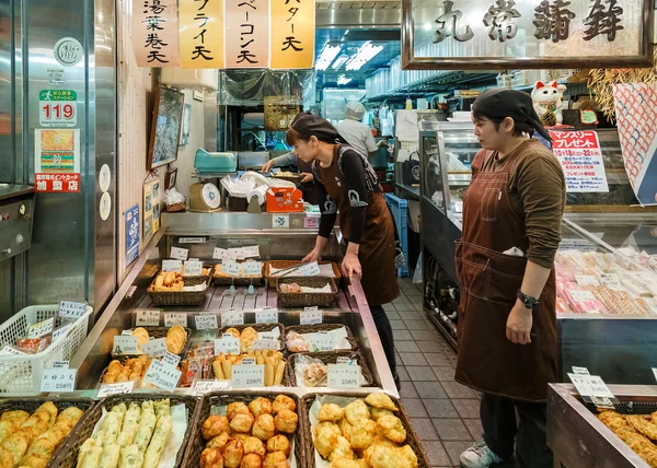 Japanese Shop Keeper at Nishiki Market in Kyoto