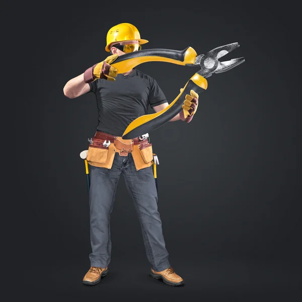 Construction worker with tool belt and pliers