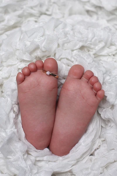 Baby feet with rings