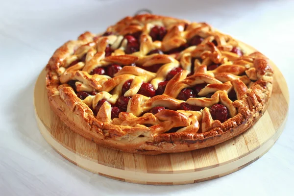 Homemade cherry pie with decorative lattice top