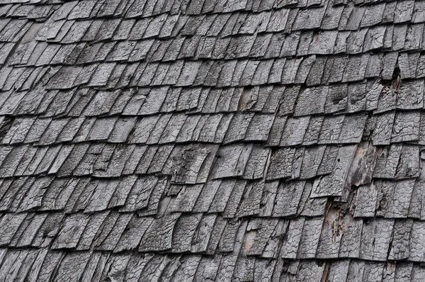 Wooden roof texture. Brown wooden tile background