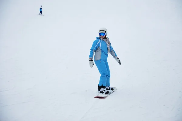 Skiers and snowboarders at a ski resort in Moscow