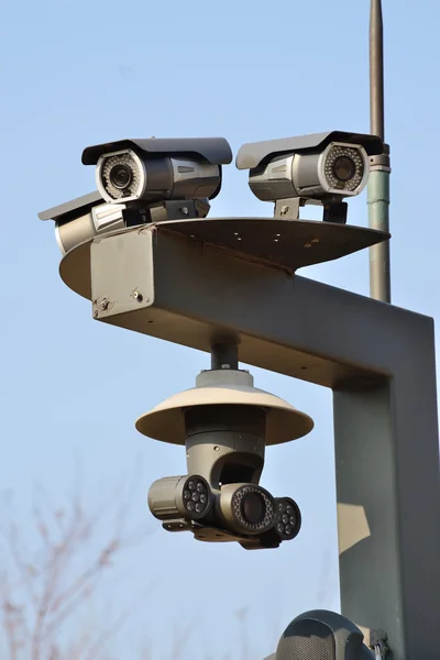 Closeup of three Infrared CCTV surveillance cameras
