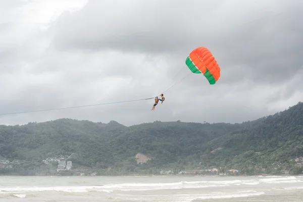 PHUKET, THAILAND - AUGUST 01, 2013: unsafe parasailing