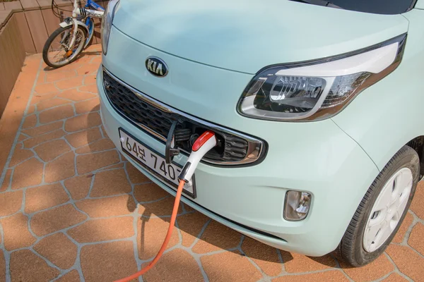 Jeju-do, Korea - April 10, 2015: recharging KIA Ray EV electric