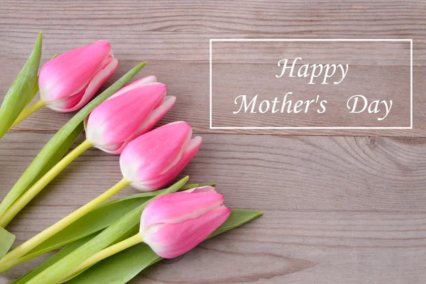 Mothers day. Mothers day flowers. Mothers day card with tulips. Pink tulips for mother day. Mothers day background and mother day flower. Mothersday gift.