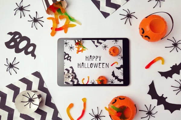 Halloween holiday background with tablet