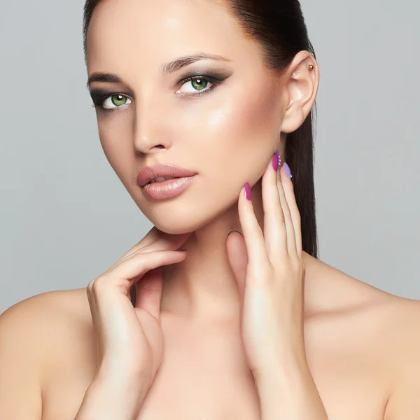 Fashion Beauty Portrait of Beautiful Girl Face. Professional Makeup. Vogue Style Woman. healthy clean skin