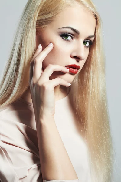 Blond woman with manicure.Beautiful girl with evening make-up