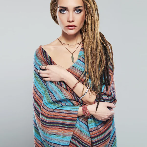 Beautiful girl with dreadlocks. pretty young woman with braids African hairstyle hippie