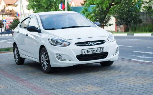 White Hyundai Solaris parked
