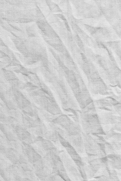 White canvas with delicate striped pattern, crumpled.