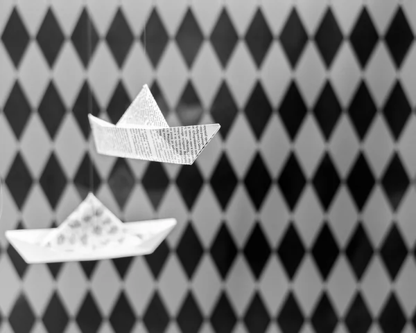 Paper Boats with Checkered Background