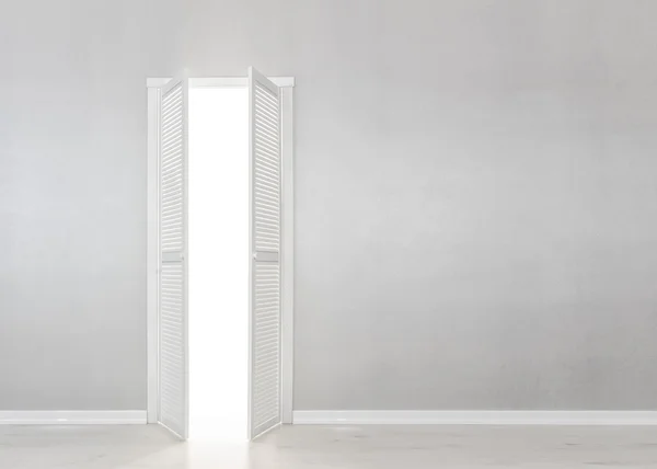 Open White Door on grey Wall