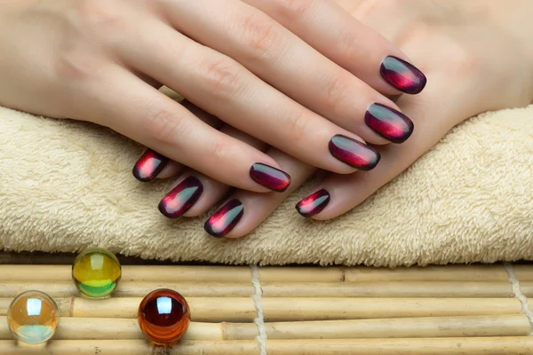 Beautiful woman's nails with nice stylish manicure in the salon