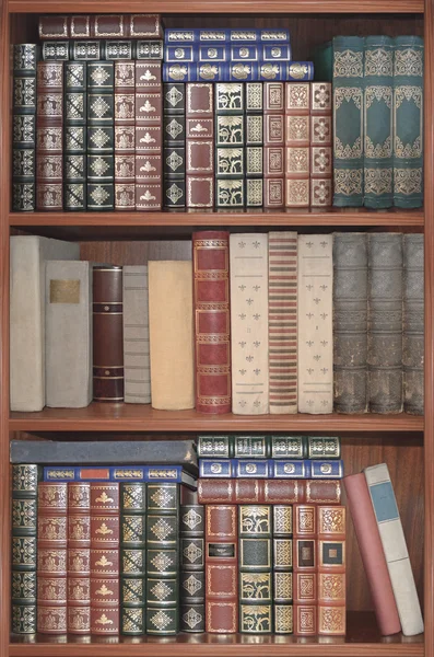 Old library,  cover books on shelves