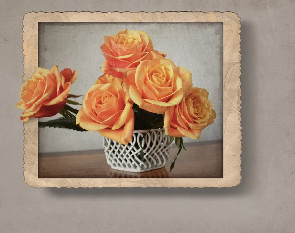 Bouquet of roses in fotoframe, with retro vintage style effect