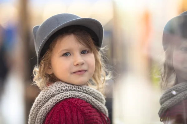 Baby girl considering  layout  showcase shopping center