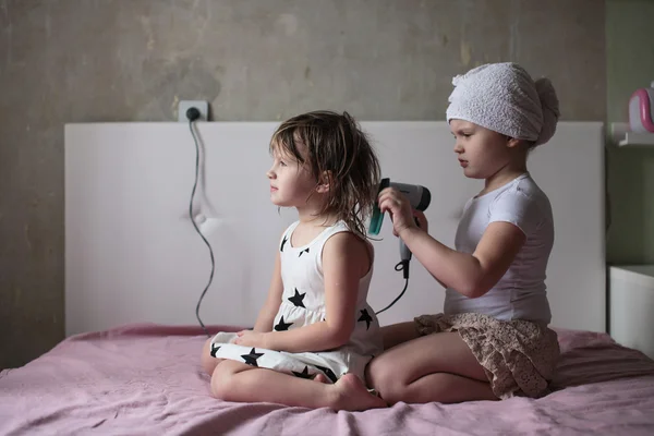 Girls siblings dried each other's hair, sisters, caring for each