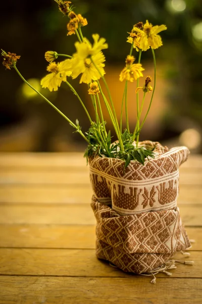 Beautiful yellow flowers wrapped in cotton.