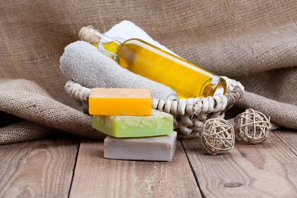 Colorful handmade soap bars, on wooden background