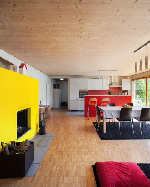 Interior,  living room with yellow fireplace