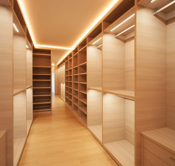 Elegant wooden walk-in closet