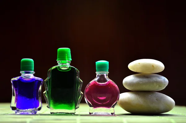 Bottles with colored aroma oils