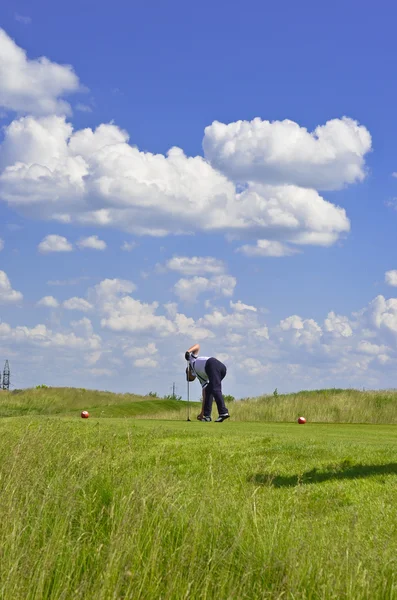 Man Playing Golf on Green Golf Course