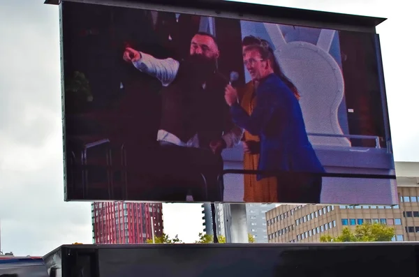 Opening ceremony of the new Markthal on street tv screen, 01 October 2014 in Rotterdam, Netherlands.