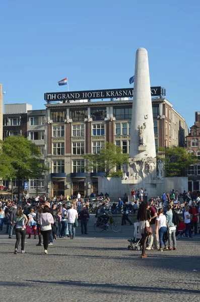 Famous stone pillar - National Monument on Dam Square. Amsterdam, Netherlands. Fragment.