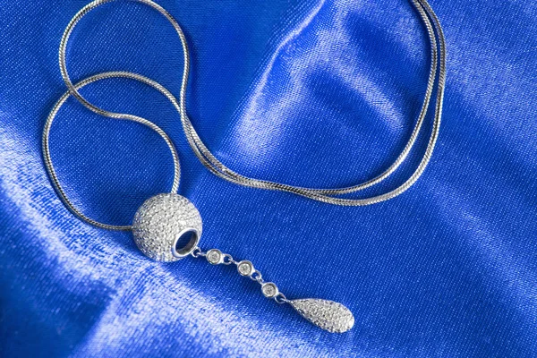 Necklace on satin