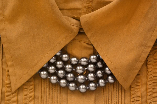 Beads on blouse
