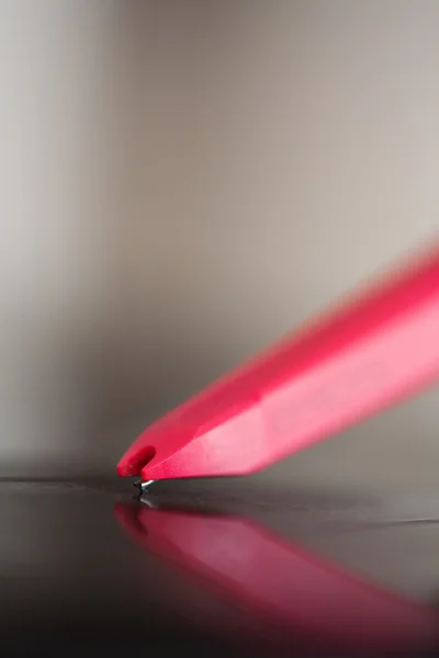 Record player with a needle touching