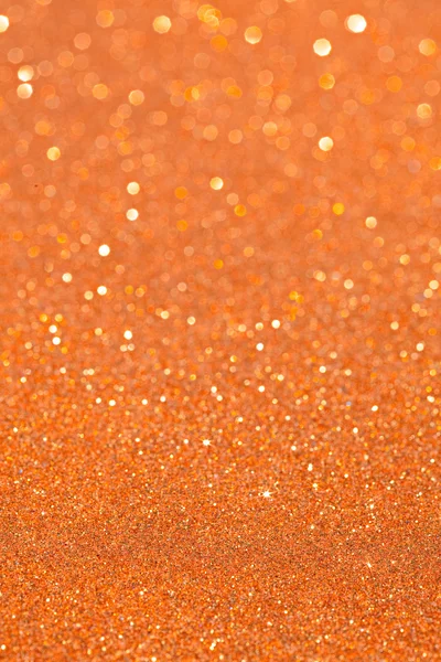 Abstract ocre orange glitter festive background